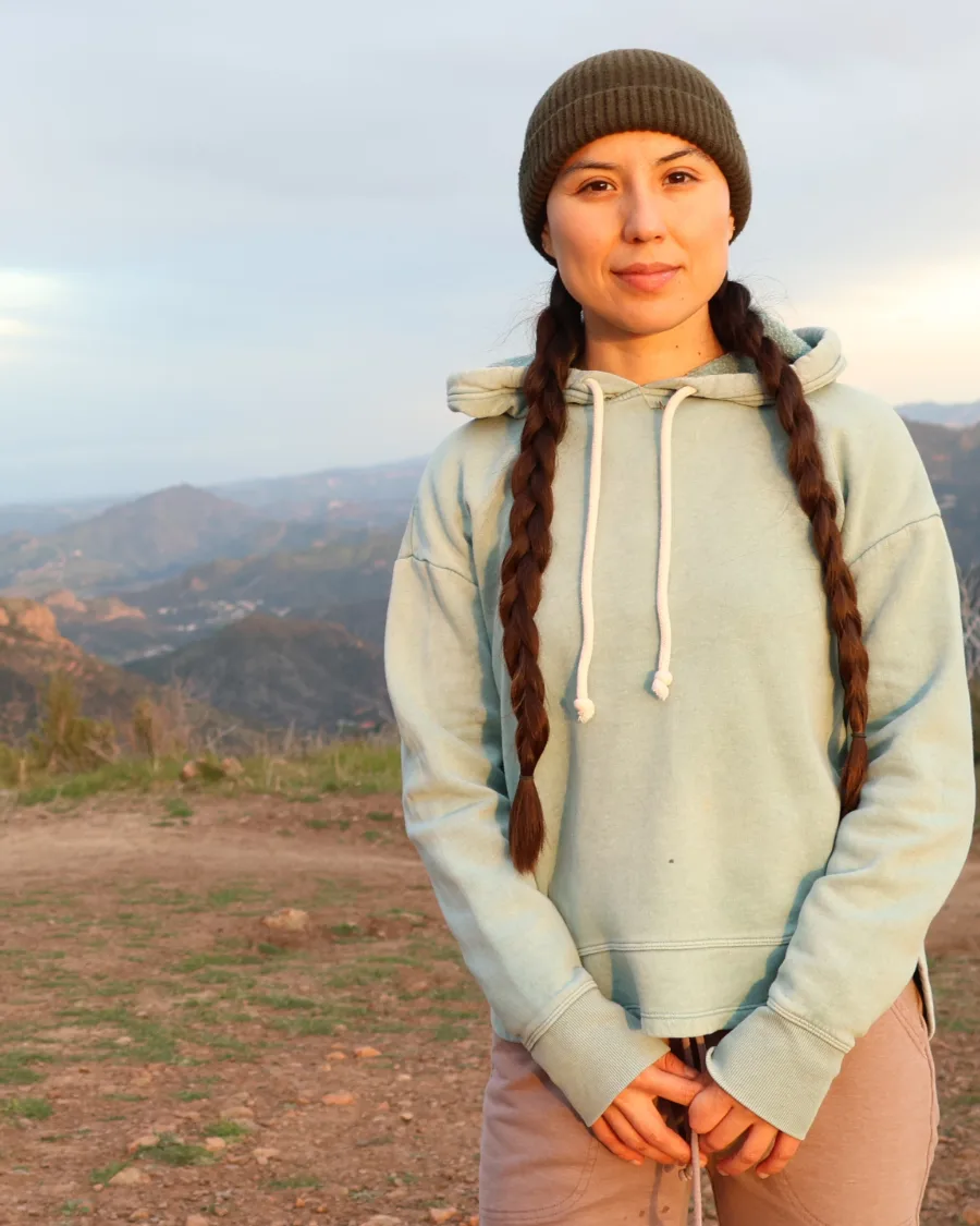 My wife on a mountain trail at sunset